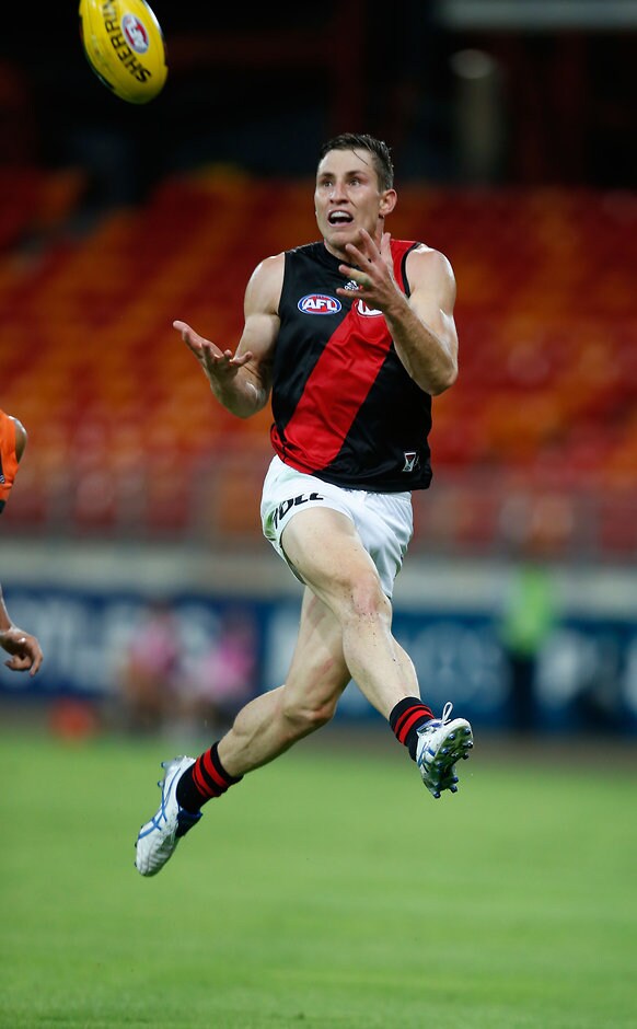 AFL 2015 NAB Challenge - GWS Giants v Essendon James Polkinghorne of the Bombers marks the ball during the 2015 NAB Challenge Week 3 match between the GWS Giants and the Essendon Bombers at Spotless Stadium, Sydney on March 13, 2015. (Photo: Anthony Pearse/AFL Media)